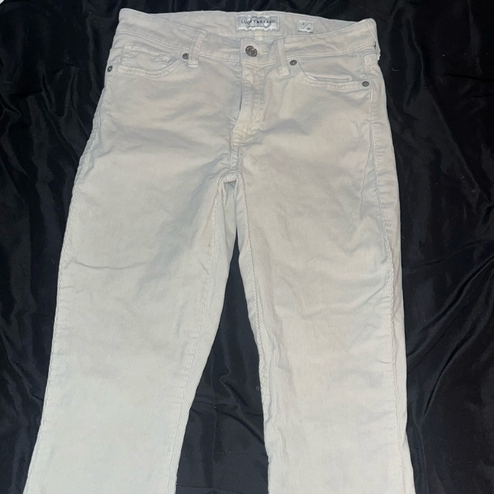 skinny jeans, cream colored, worn twice to special events, size 2/26